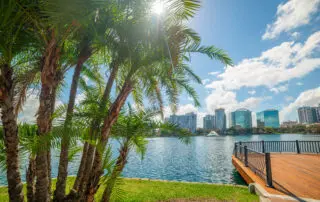 Sun shining over beautiful Lake Eola park in Orlando